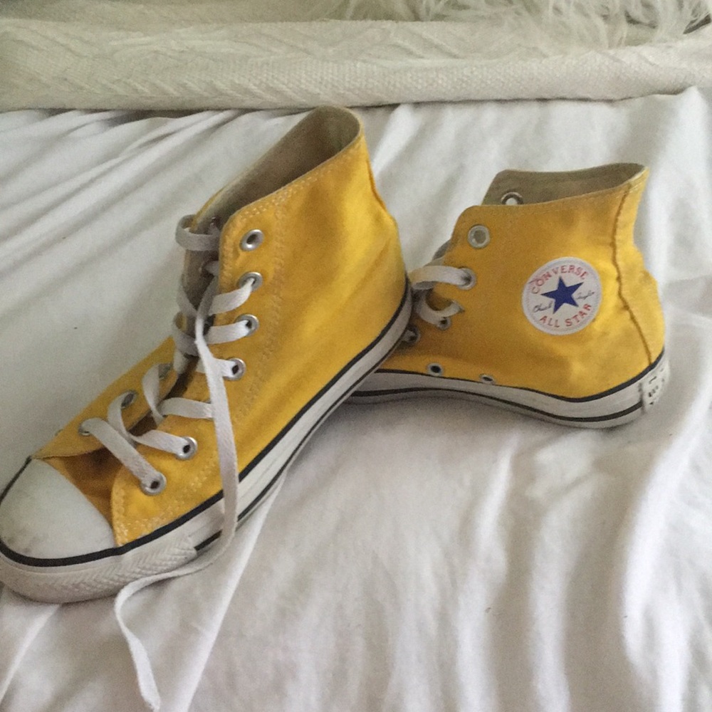Yellow high top converse